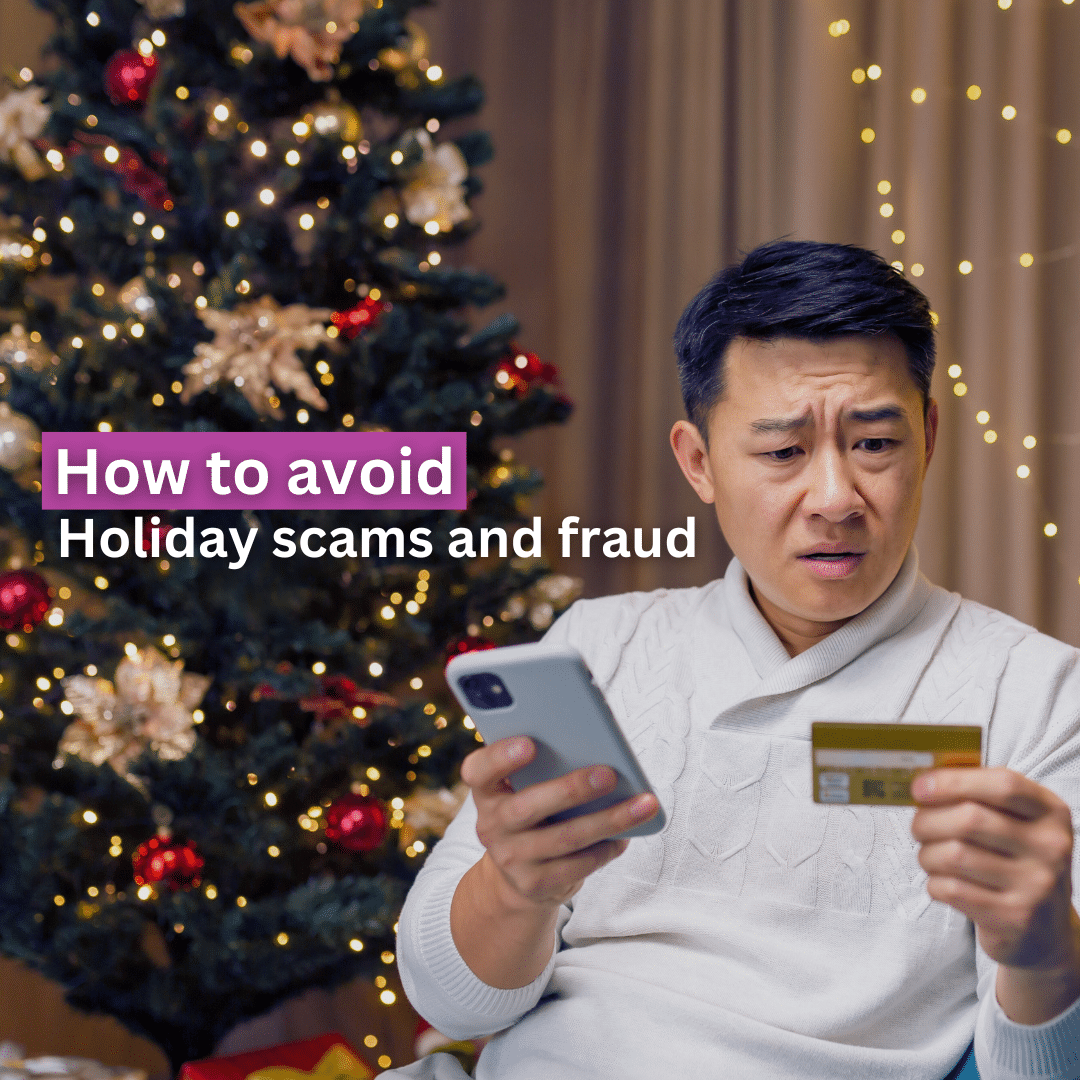 How to avoid holiday scams and fraud Dissatisfied Asian man trying to make a purchase in an online internet store, man cheated on Christmas, sitting on sofa in living room with smartphone in hands and credit card at home near Christmas