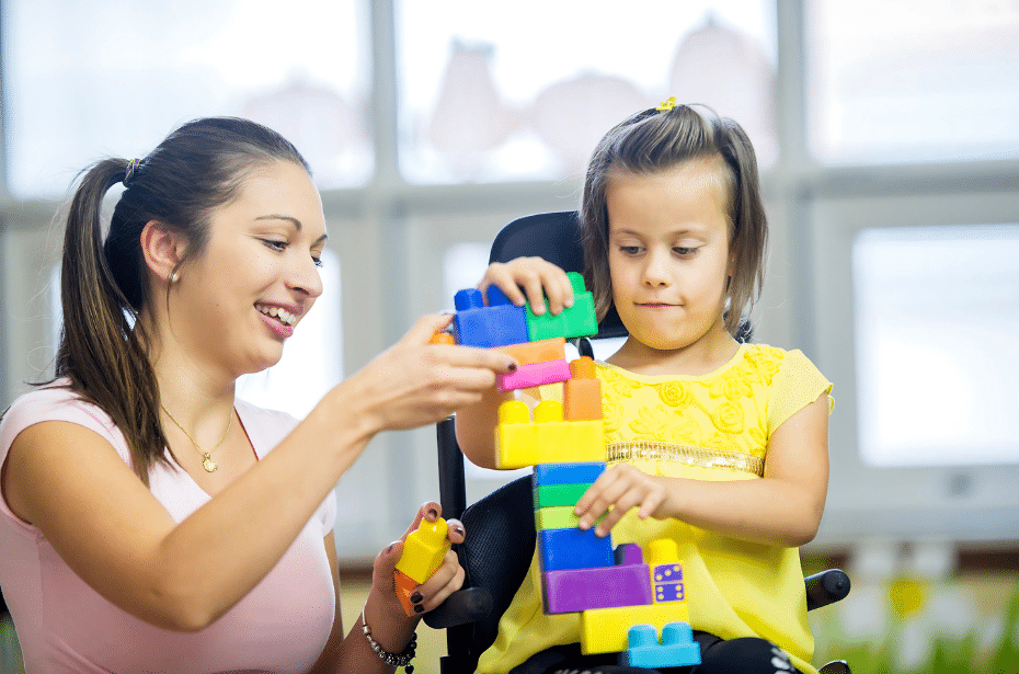 support worker disabled child client playing blocks fun interactive april school holidays