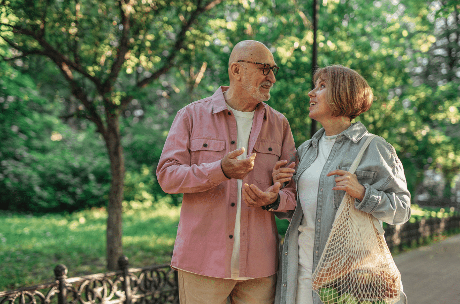 elderly old couple walk stroll groceries talk discussion nature 